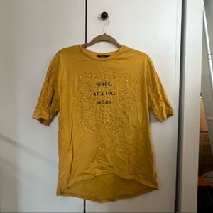 “Once at a full moon” asymmetrical top